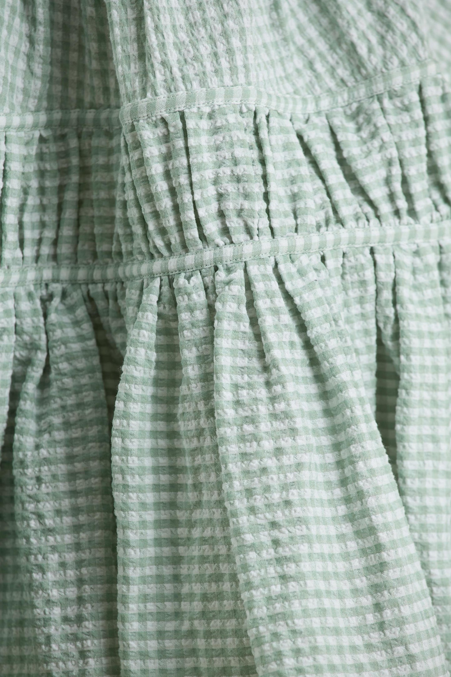 Laurelle Green Extreme Plunge-Neck Mini Dress With Ruffling Detail