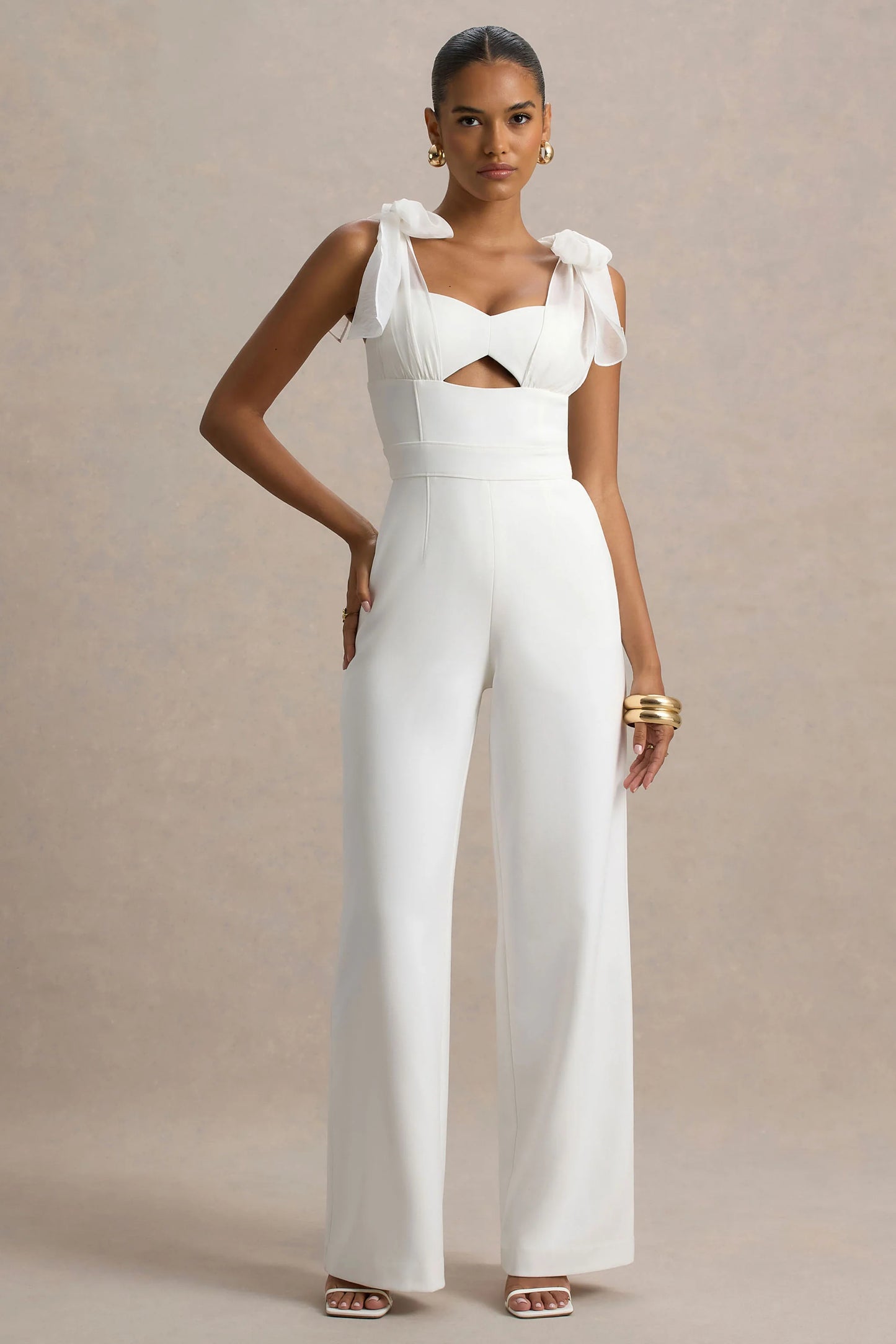 Claudelle White Flared-Leg Jumpsuit With Organza Bow Straps