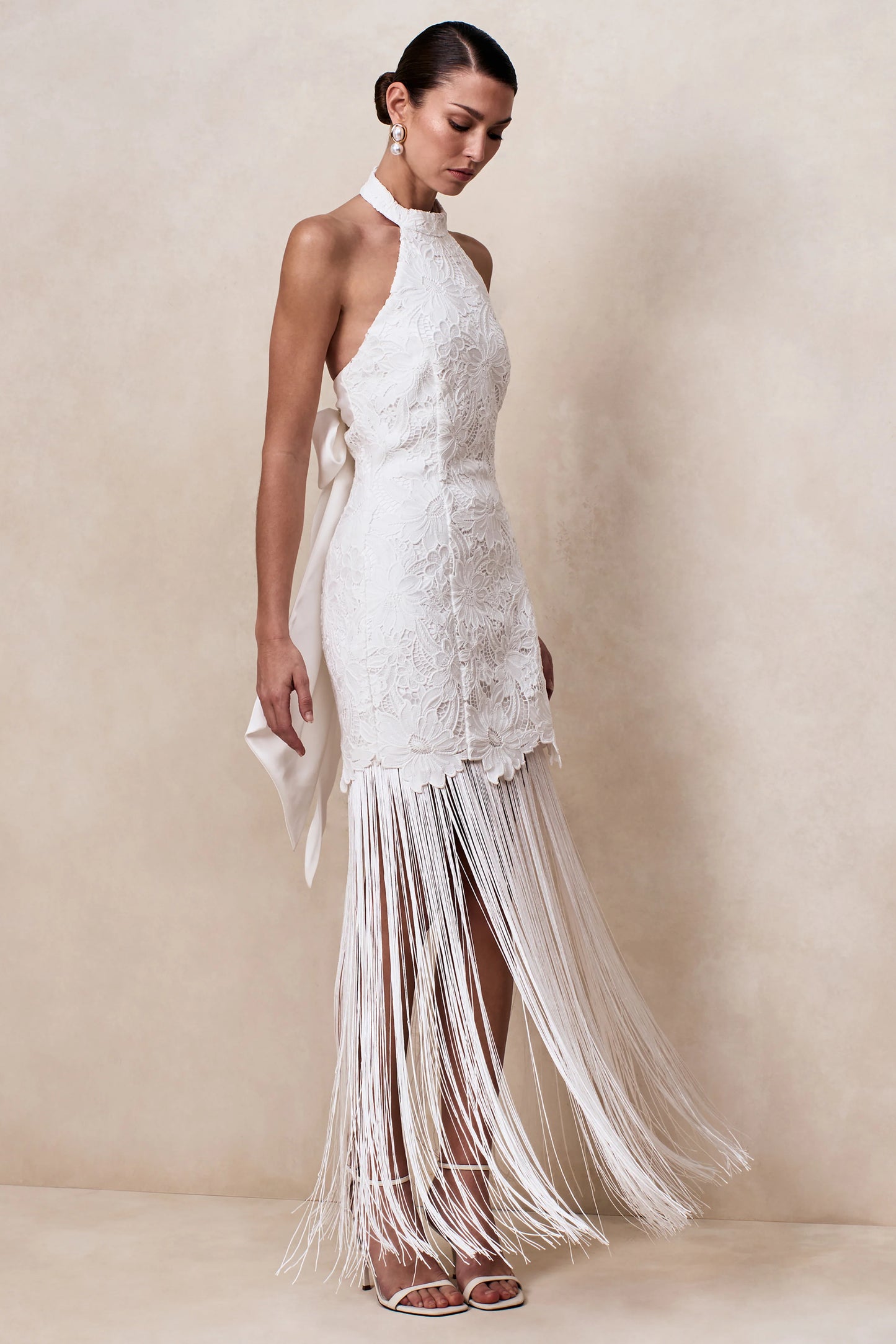 Skylar White Lace Halter-Neck Maxi Dress With Open-Back And Bow Detail