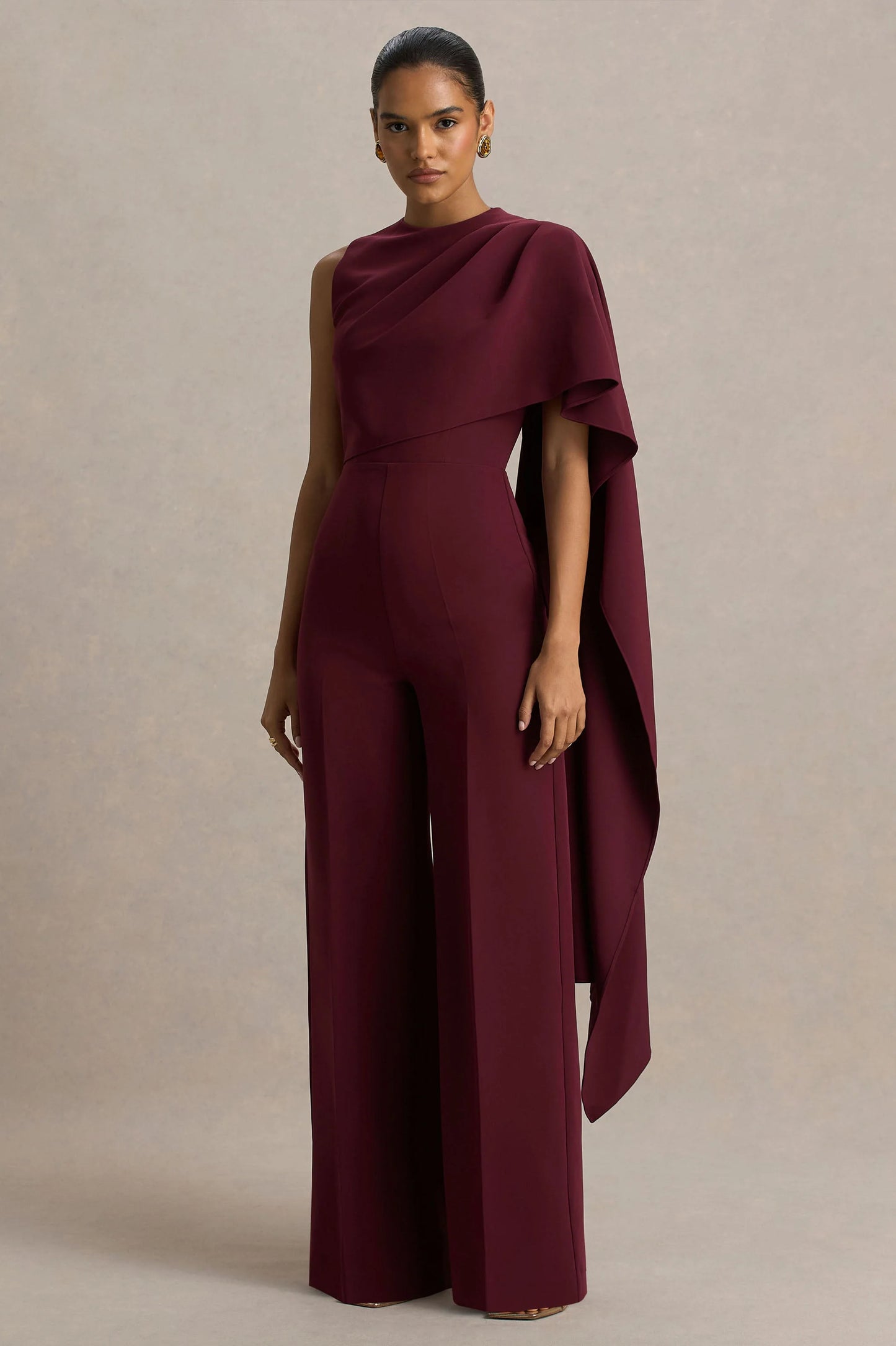 Sorenia Burgundy High-Neck Jumpsuit With One-Cape Sleeve