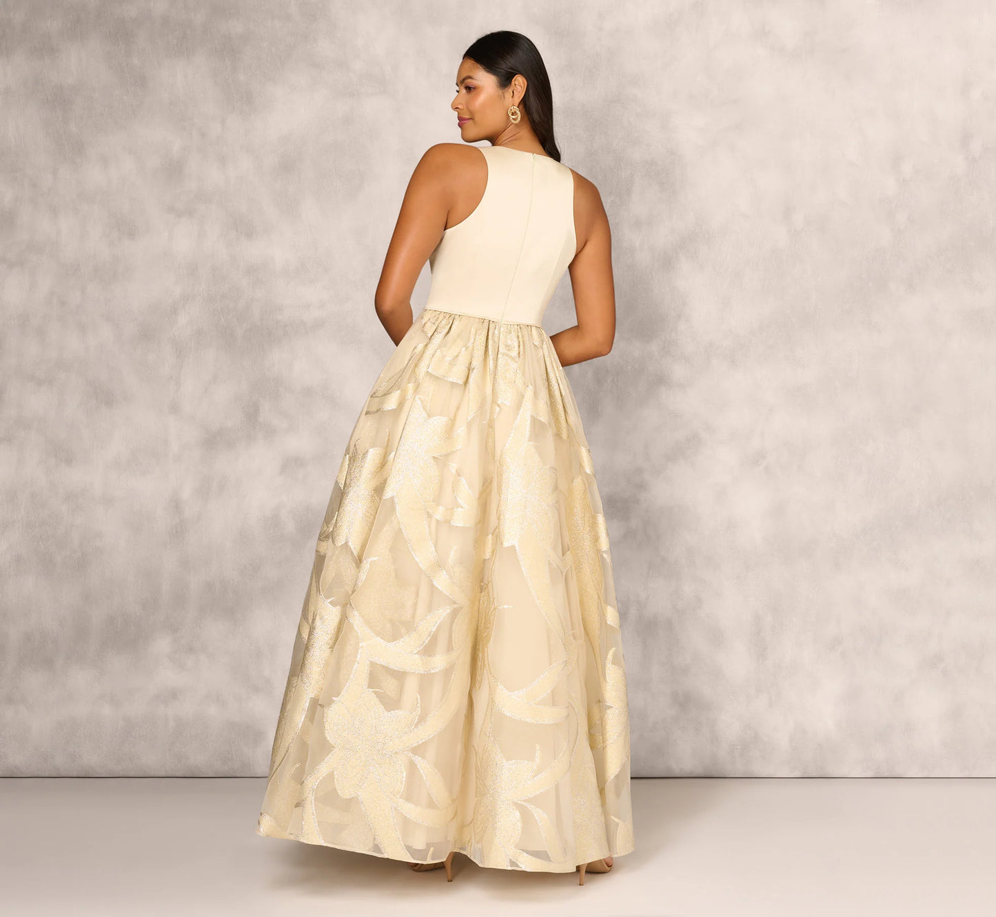 Metallic Jacquard Sleeveless Ball Gown With Crinoline Details In Light Gold