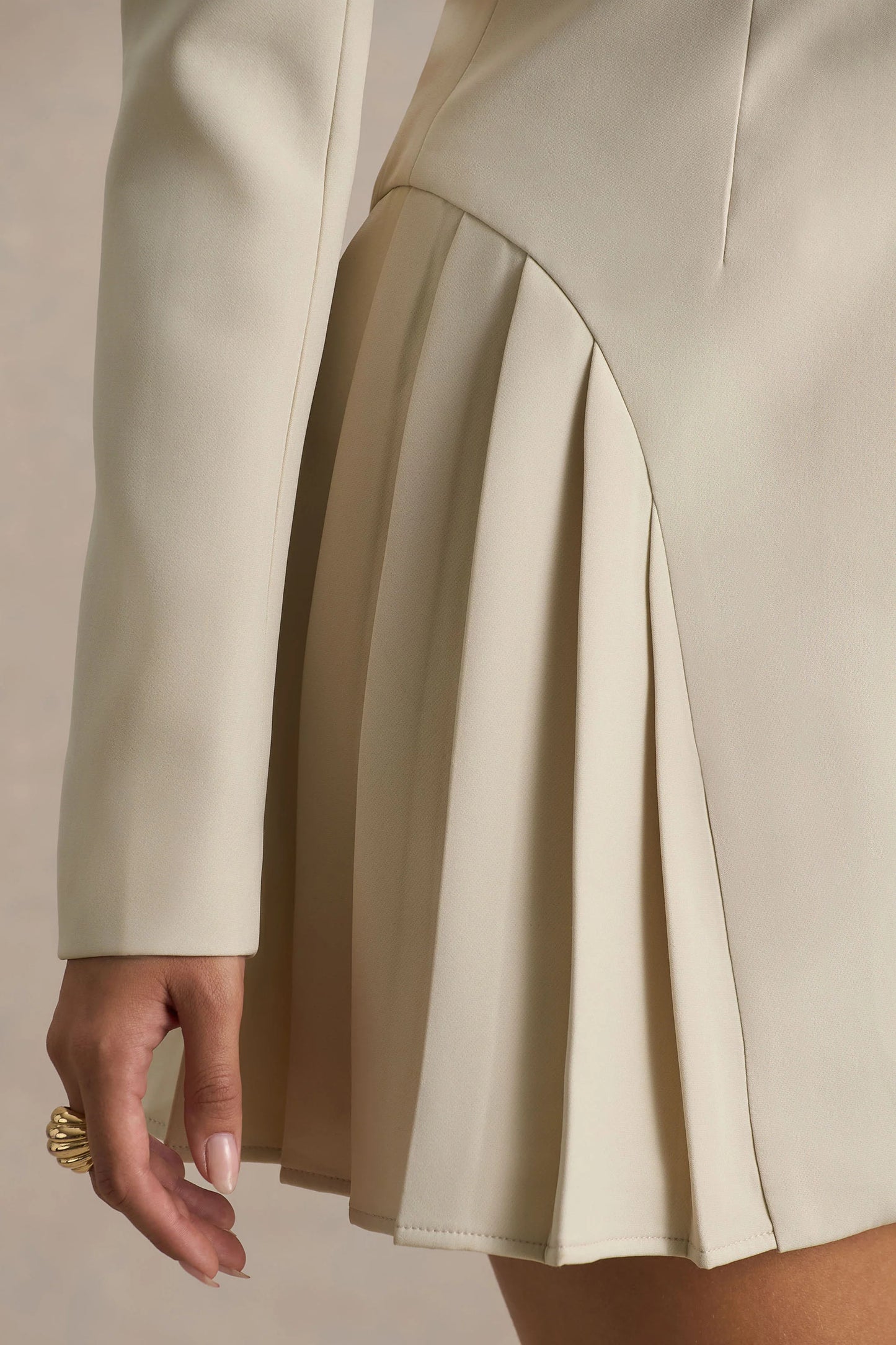 Blossoming Nude Plunge-Neck Tailored Mini Dress With Pleating