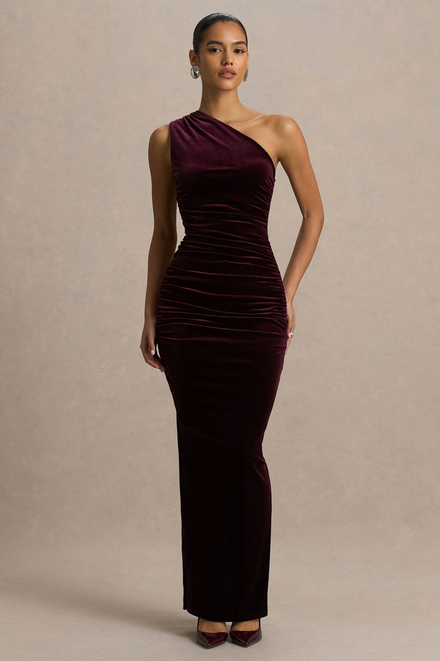 Treat Burgundy Velvet Asymmetric-Neck Maxi Dress With Ruched Detailing.
