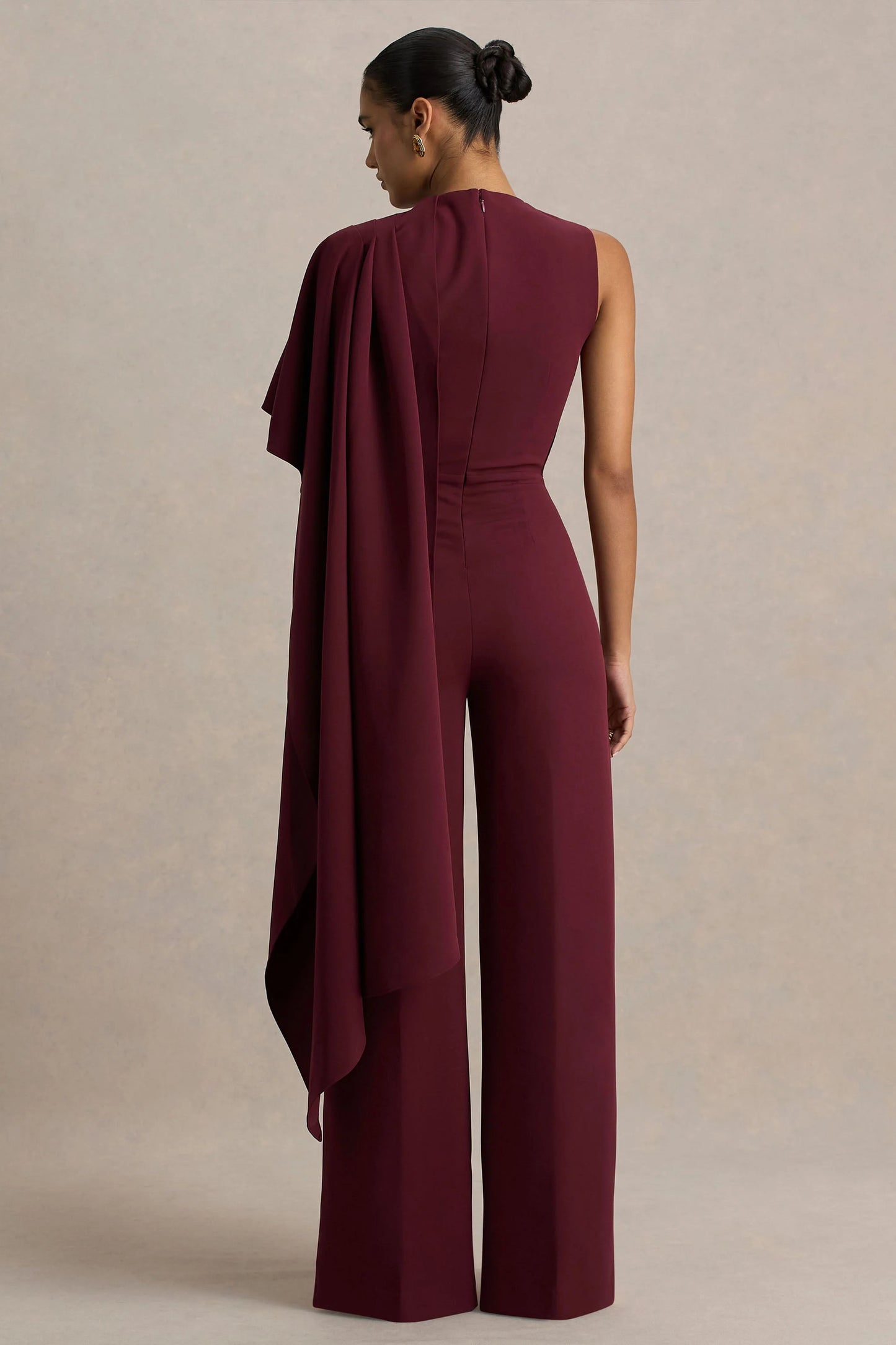 Sorenia Burgundy High-Neck Jumpsuit With One-Cape Sleeve