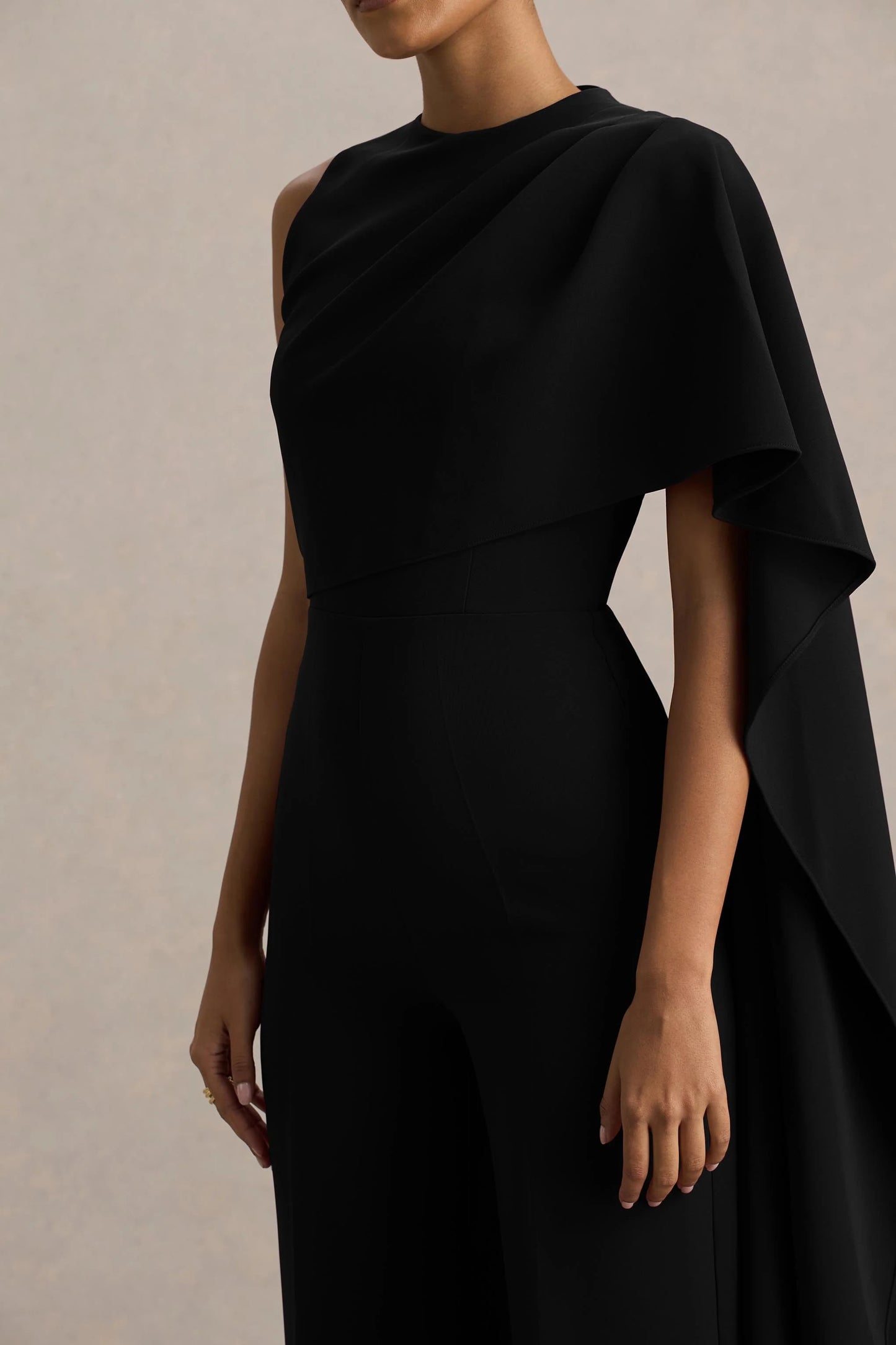 Sorenia Black High-Neck Jumpsuit With One-Cape Sleeve