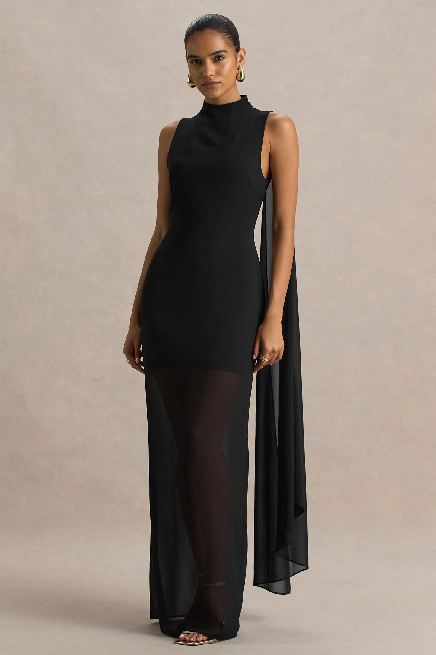 Unpredictable Black High-Neck Maxi Dress With Back Cape Detail