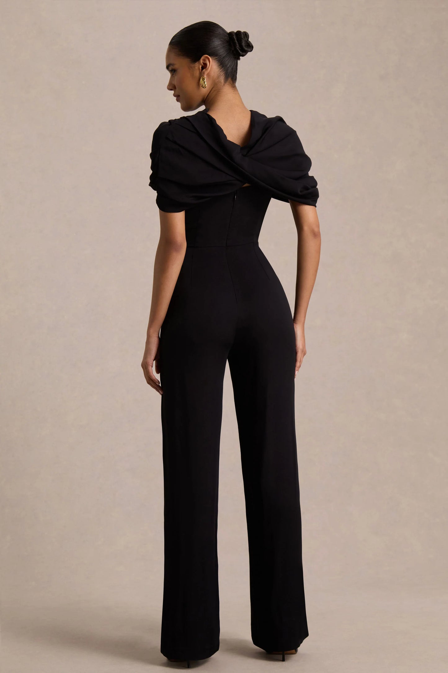 Raquel Black Asymmetric-Neck Jumpsuit With Twisted Cape Detail