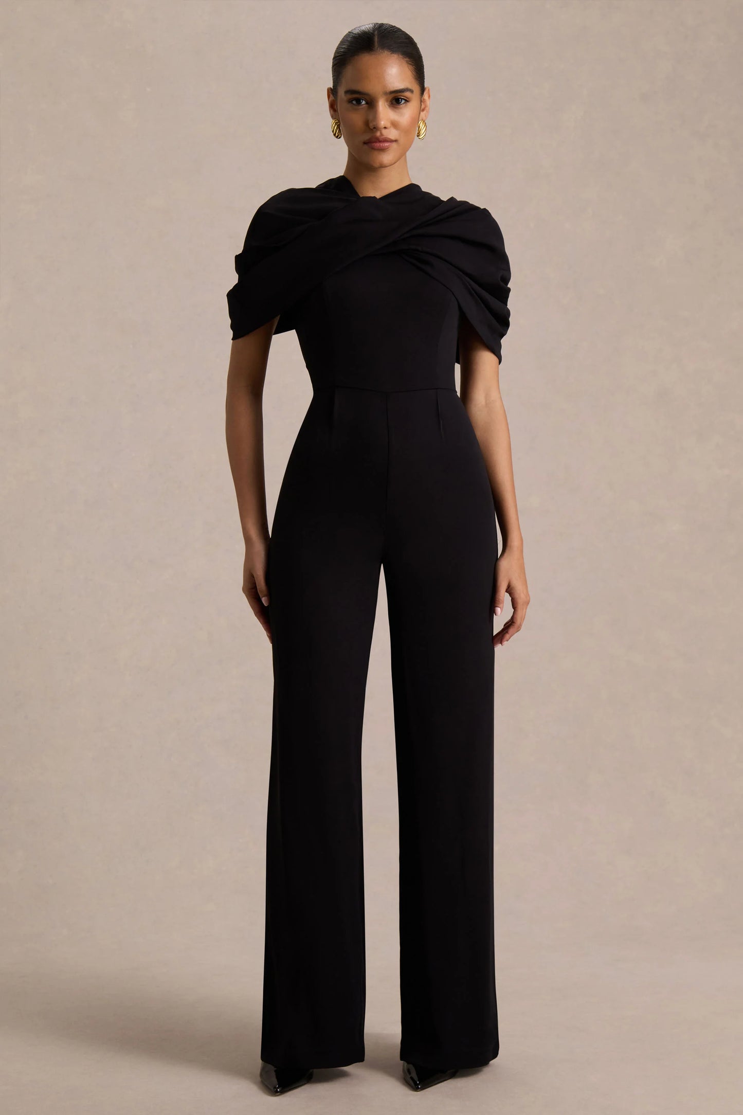 Raquel Black Asymmetric-Neck Jumpsuit With Twisted Cape Detail