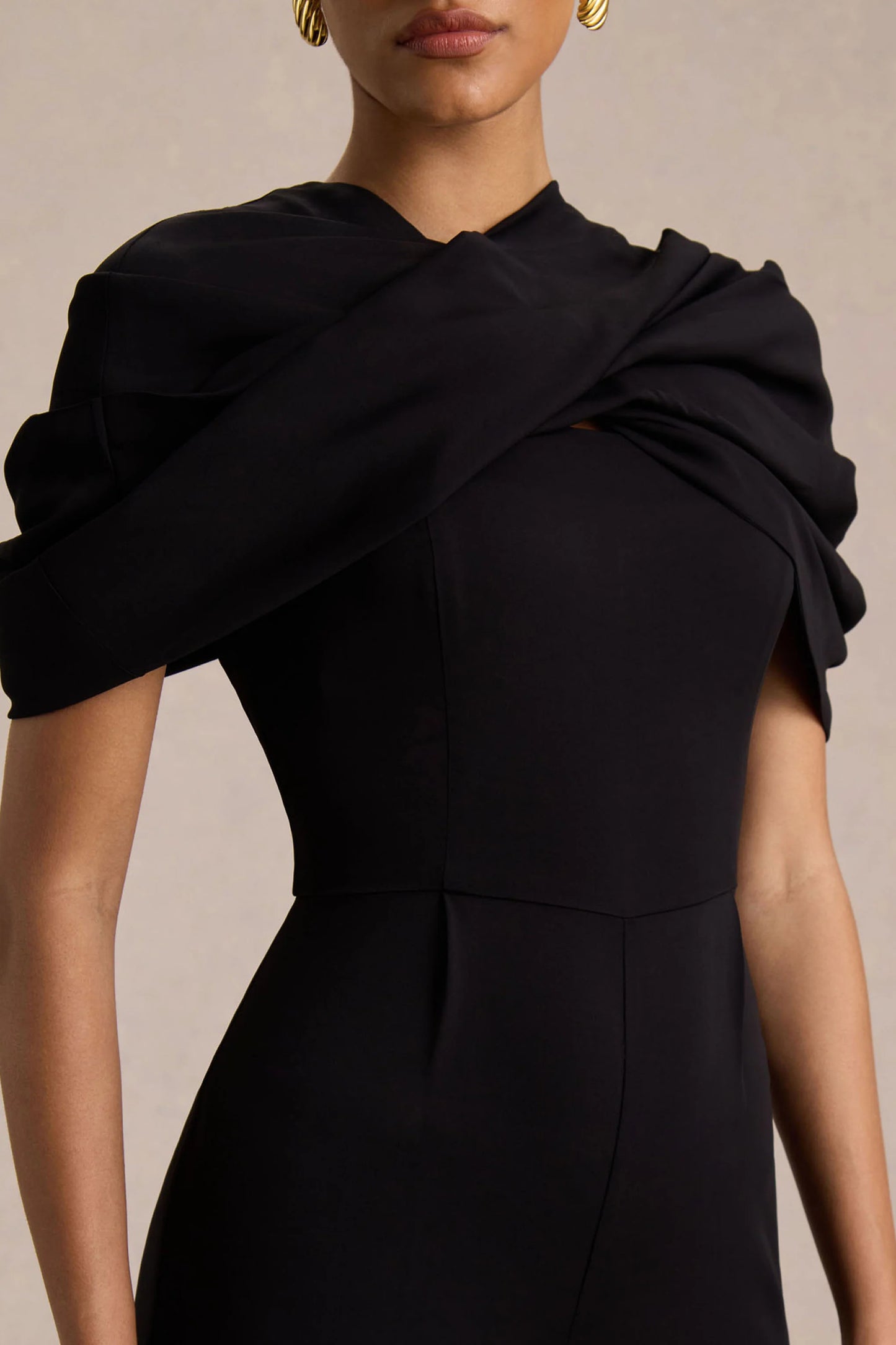 Raquel Black Asymmetric-Neck Jumpsuit With Twisted Cape Detail
