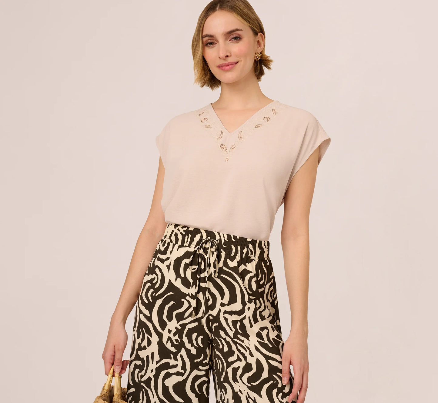 Sleeveless Embroidered V Neck Top In Pebble