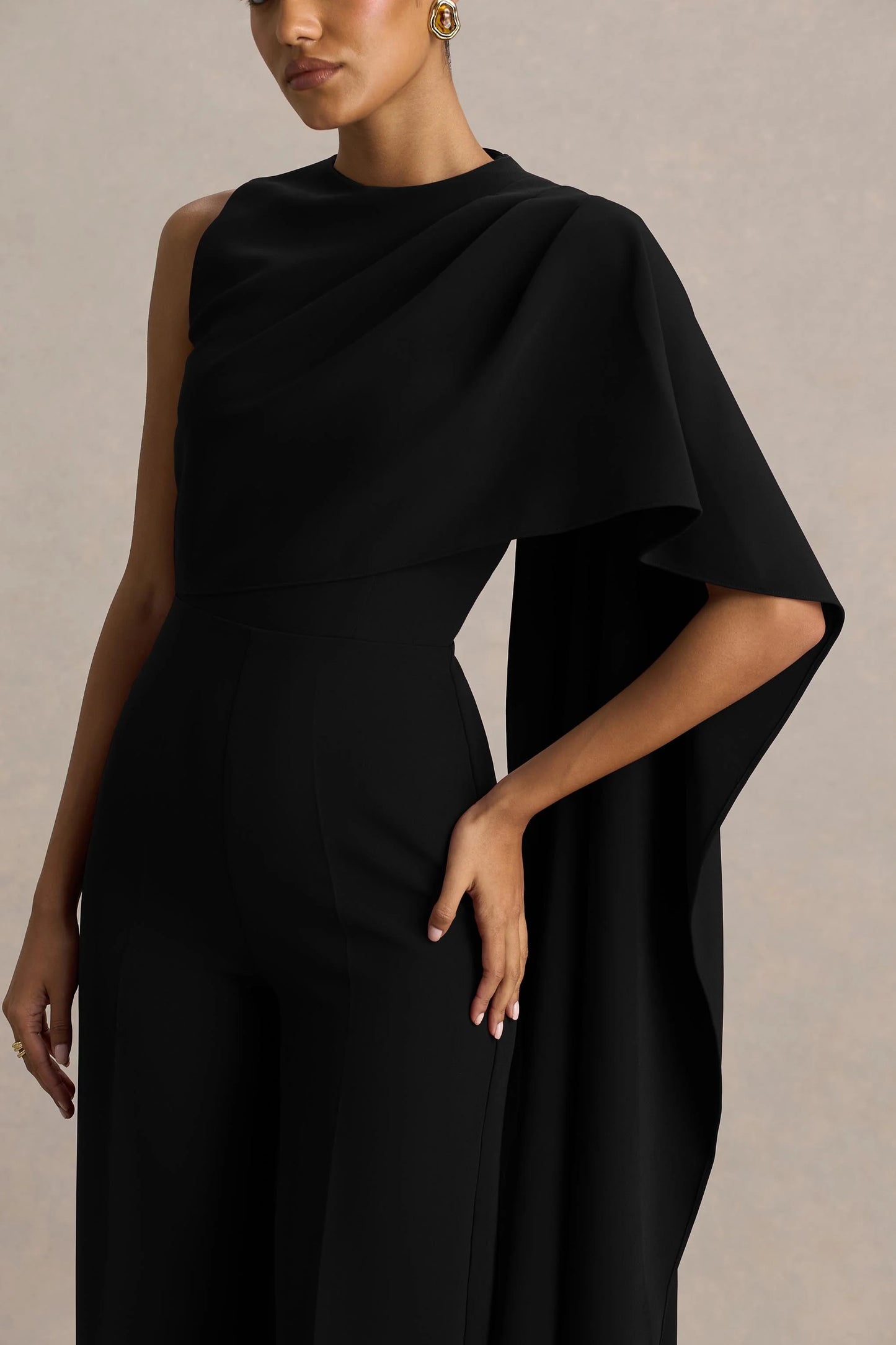 Sorenia Black High-Neck Jumpsuit With One-Cape Sleeve