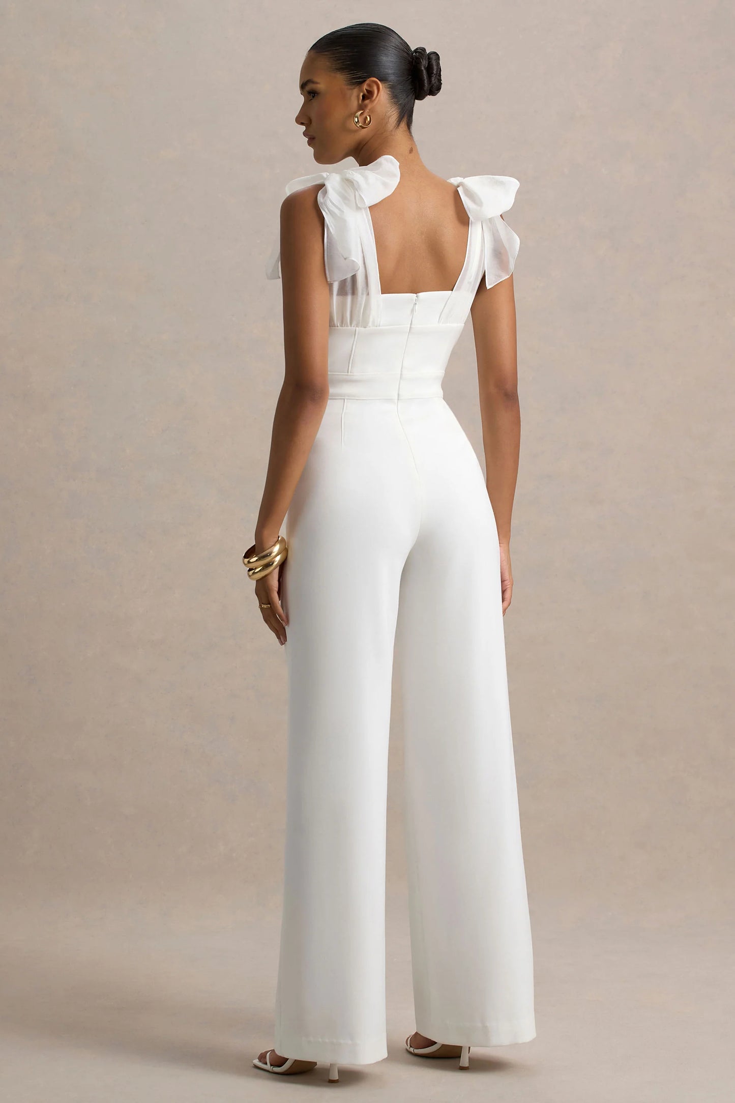 Claudelle White Flared-Leg Jumpsuit With Organza Bow Straps