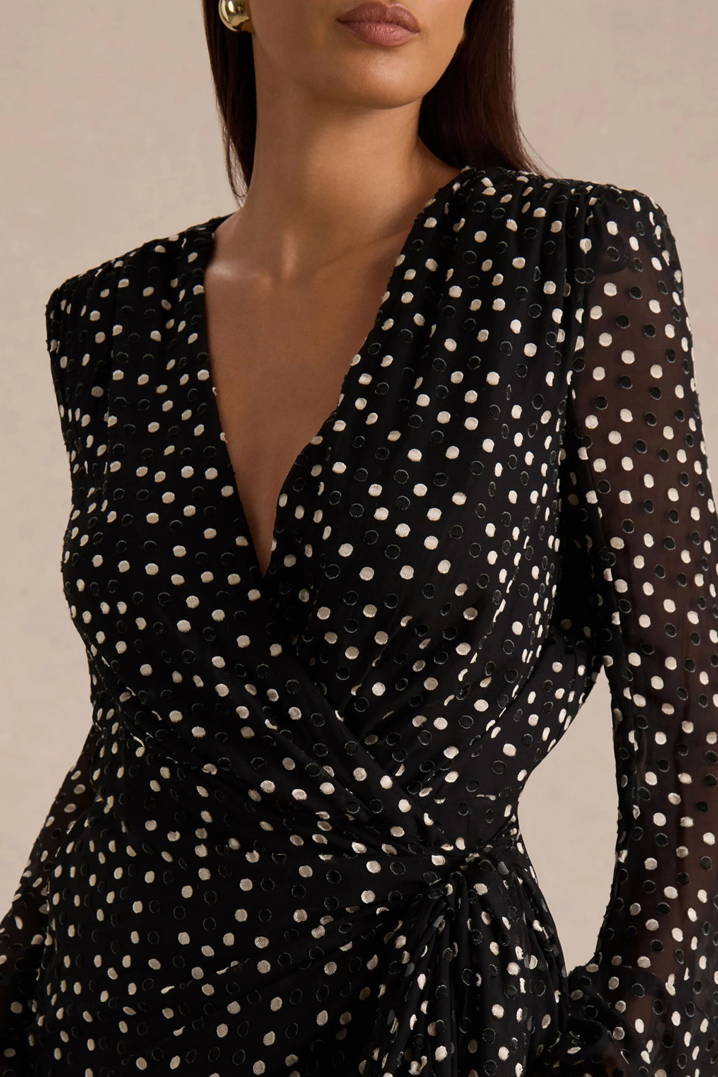 Mela Black And White Polka Dot Plunge-Neck Mini Dress With Bell-Sleeves And Sash Detail