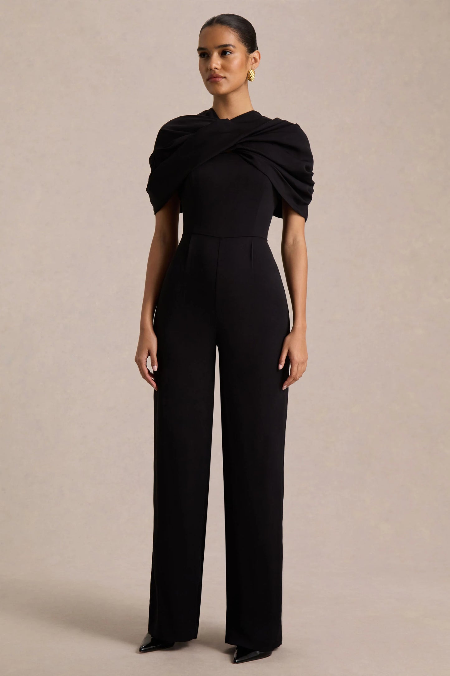 Raquel Black Asymmetric-Neck Jumpsuit With Twisted Cape Detail