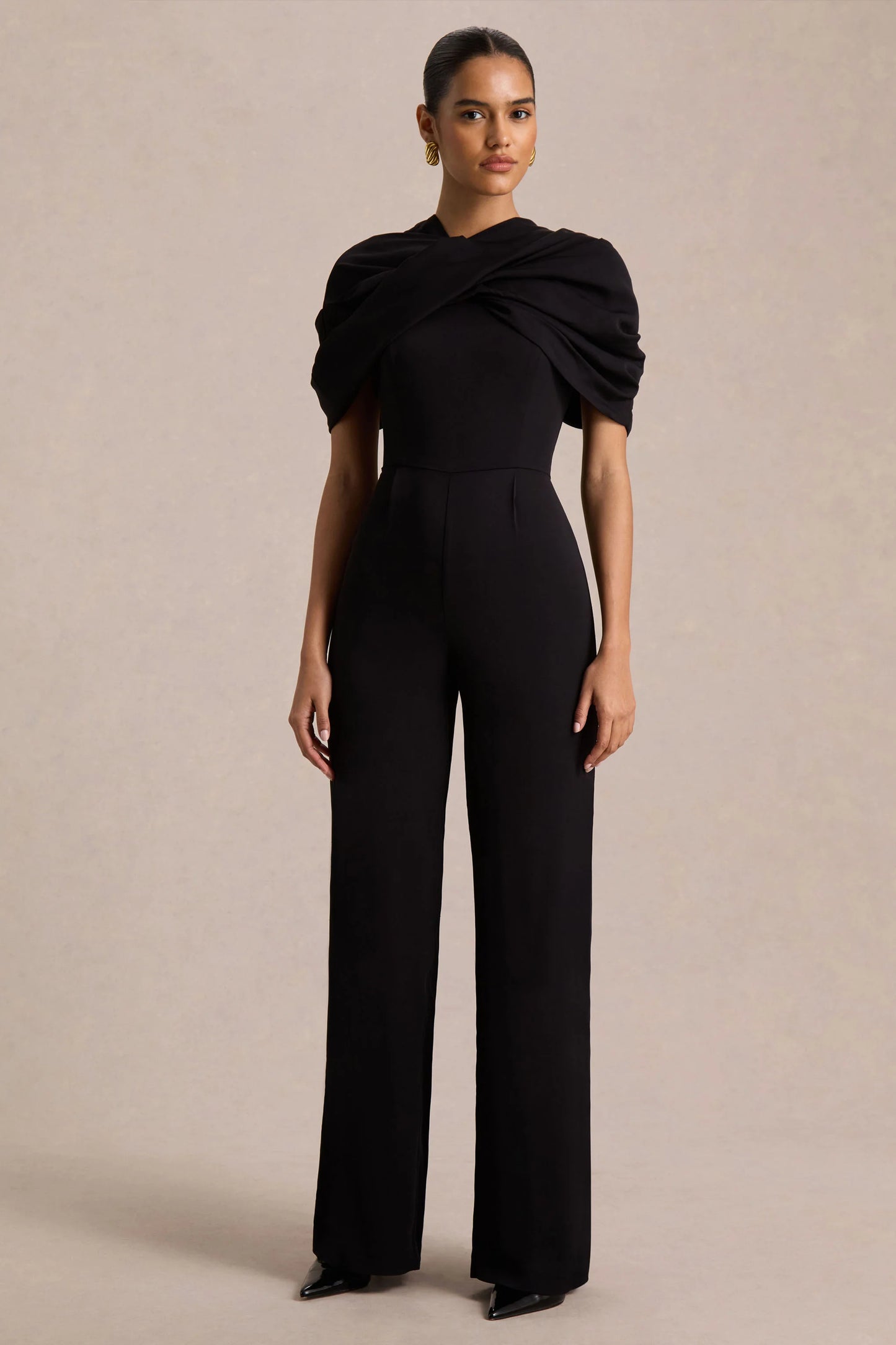 Raquel Black Asymmetric-Neck Jumpsuit With Twisted Cape Detail