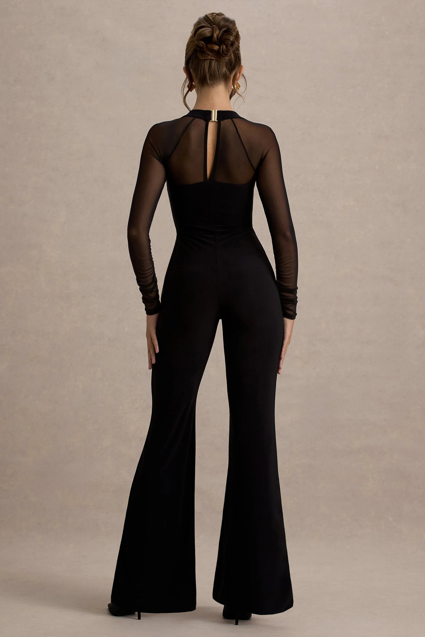 On Track Black Flared-Leg Jumpsuit With Sheer Sleeves